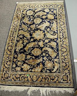 Oriental throw rug. 
3'6" x 5'6"
