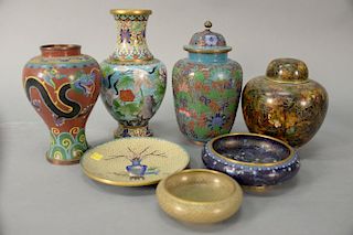 Seven cloisonne pieces to include vase with flowers and cranes, enameled wild flower and lotus cover urn, enameled tea box, f