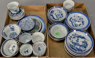 Two tray lots of Chinese export blue and white Canton Nanking porcelain cups and saucers, small plates, and bowls, forty-nine