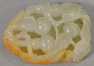 White jade carved fruit with rusit back and top. 
height 2 inches, width 1 1/2 inches