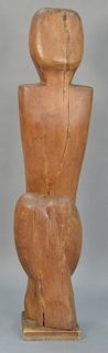 Raoul Hague (1904-1993) carved wood figure of a seated man. 
height 66 inches., 15" x 6"