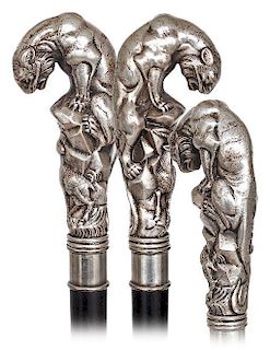 12. Silver Figural Cane -Ca. 1920 -Very large silver handle cast to depict a tiger perched on rocks and peering at a goat, pl