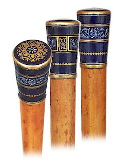 15. Porcelain Decorative Cane -Ca. 1900 -Oversized porcelain cobalt and gold Milord Knob, malacca shaft and a metal ferrule. 