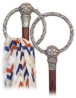 16. Silver Scarf Holder Cane -1890 -Good quality silver handle with a large and round, stirrup -like swing-over loop, hand ch
