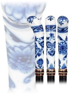 17. Meissen Porcelain Cane -19th Century -Stretching pistol shaped grip white porcelain handle decorated in cobalt blue with 
