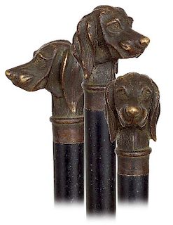 32. Dog Head Cane -Ca. 1900 -Sizeable and well modeled bronze dog head knob on an ebonized hardwood shaft. This cane might be