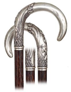 36. Silver Dress Cane -Ca. 1900 -Large silver crook handle with a longer and pointed nose decorated in the best “Wiener Wer