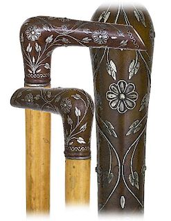 56. Piqué Day Cane -Ca. 1880 -L-shaped Holly Wood handle beautifully set with silver floral inlay, slender silver collar wit