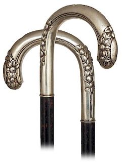 68. Silver Day Cane -Ca. 1900 -Large and well-proportioned silver crook handle chased and engraved on both sides with identic