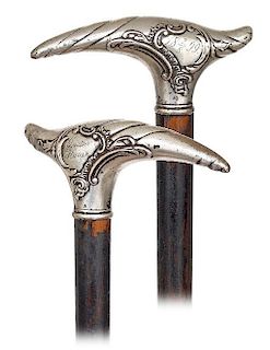 113. Silver Day Cane -Dated September 2, 1899 -Modified Derby shaped silver handle modeled with a different Baroque cartouche
