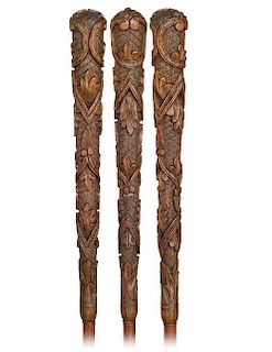 135. Dandy Badine Cane  -Ca. 1900 -Long and tapering boxwood handle delicately engraved in low relief with an intricate Gothi