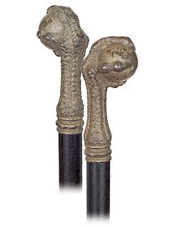 136. Britannia Ball & Claw Cane -Ca. 1890 -Straight handle fashioned of Britannia in the shape of a straight eagle paw clench