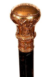 85. Gold Dress Cane- Ca. 1900- A nice gold-filled ornate handle which is signed Simmons, ornate florentine work throughout th