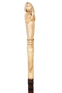 91. Japanese Stag Cane- Ca. 1890- An unusual stag handle with a carved long bearded man with his mouth wide open and a monkey