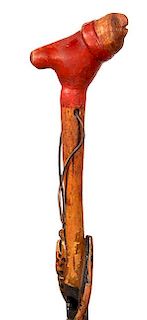 94.  Folk Art Snake Cane- Ca. 1880- A carved and painted folk cane with what appears to be a bear head in a red polychromed l