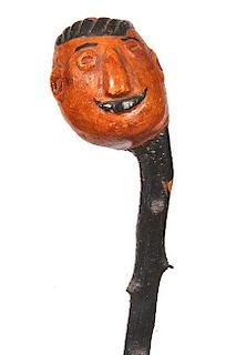 95. Blackthorn Folk Art Cane- Ca. 1900- A once piece blackthorn folk cane with its original root handle which is carved to de