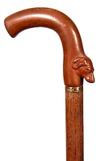 151. Dog Dress Cane- Ca. 1885- A Gutta Percha molded handle with a flop eared dog molded at the lower end of the handle, gold
