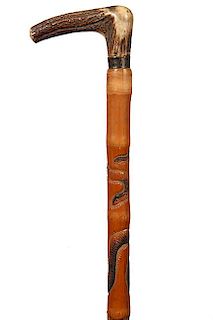 159. Horse Measure Cane- Ca. 1900- A stag handle with original patina, a fold out brass rule which has never had a level, a 2