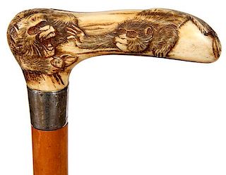 183. Stag Monkey Cane- Ca. 1890- A Japanese stag handle with two high relief monkeys which are playing , signed sterling coll