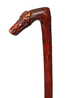 177. Island Horse Cane- Ca. 1935- A carved one piece hardwood branch of a horse in bridal and a metal ferrule. H.- 4” x 1