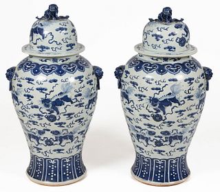 CHINESE EXPORT PORCELAIN BLUE AND WHITE PAIR OF PALACE URNS WITH COVERS