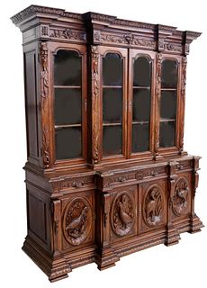 FRENCH HIGHLY-CARVED OAK BREAKFRONT BOOKCASE