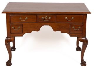 AMERICAN CHIPPENDALE-STYLE CARVED WALNUT DESK