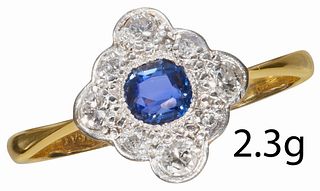 ART DECO SAPPHIRE AND DIAMOND CLUSTER RING.