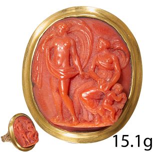 FINE ANTIQUE CARVED CORAL CAMEO RING.