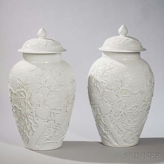 Pair of Large White-glazed Covered Jars 壽桃浮雕白釉蓋罐一對