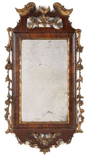 DIMINUTIVE ENGLISH OR CONTINENTAL PARCEL-GILT AND ROSEWOOD WALL MIRROR