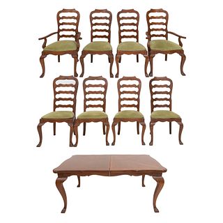 COMEDOR. SXX. Elaborado en madera. Consta de: Mesa con cubierta rectangular, sistema de extensiones, extensiones, 6 sillas y 2 sillones