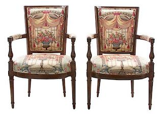 A Pair of Louis XVI Style Carved Fruitwood and Upholstered Fautueils Height 35 x width 22 x depth 18 inches.