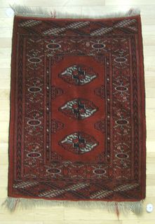 Bokhara mat, 3'8" x 2'7", together with a braidedh