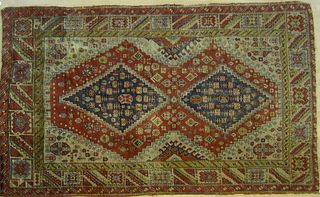 Caucasian throw rug, early 20th c., 9'10" x 6'3".