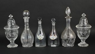 Four Colorless Glass Decanters
