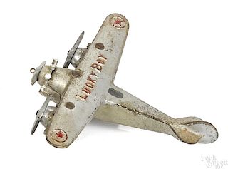 Dent cast iron Lucky Boy tri-motor airplane with embossed wings, 7 1/4'' wingspan.