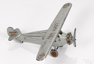 Dent cast iron Lucky Boy airplane, embossed X5043 on tail, with a nickel-plated propeller