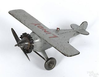 Hubley cast iron Lindy airplane with a nickel-plated propeller, 10'' wingspan.