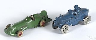 Two cast iron racers, to include an A.C. Williams with a painted driver, 5 1/4'' l.