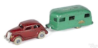 Arcade cast iron Ford sedan with The Covered Wagon trailer, 11 1/2'' l.