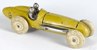 Hubley cast iron racer with a driver and a battery-powered headlight, 6 1/4'' l.