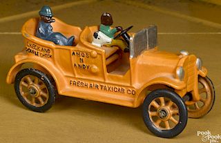 Dent cast iron Amos n Andy Fresh Air Taxicab Co. with a painted driver, a passenger, and a dog