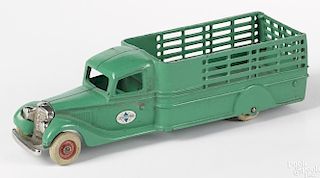 Arcade cast iron International high side stake truck with a nickel-plated grill and bumper