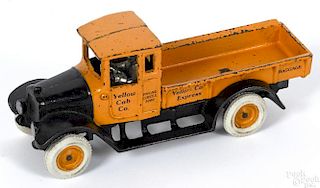 Arcade cast iron Yellow Cab Co. Express Baggage truck with a nickel-plated driver, 10'' l.