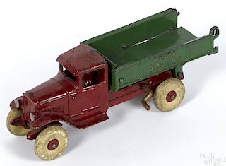 Kenton cast iron State Highway dump truck with a painted driver, 9 3/4'' l.