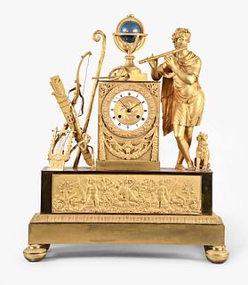 A monumental French Empire gilt bronze figural mantel clock