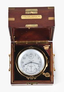 A good mid 20th century Hamilton model 21 marine chronometer with boxes
