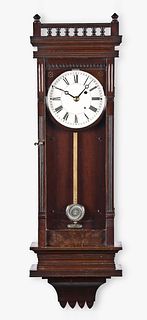 Boston Clock Co., regulator clock in an Eastlake style cherry case
