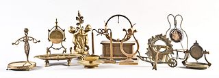 A lot of ten 19th & 20th century brass and spelter watch holders